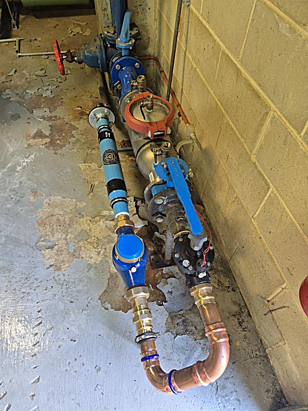 PW200 and new meter installed, viewed along the pipe run