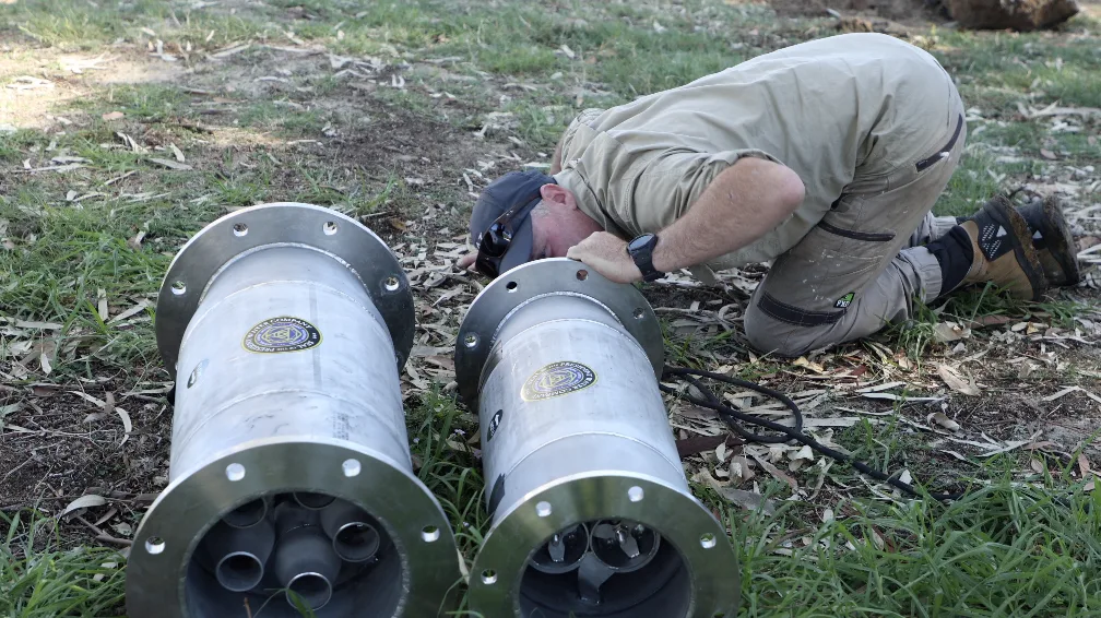 Flange faces on the inline units, showing the internal vortex assemblies